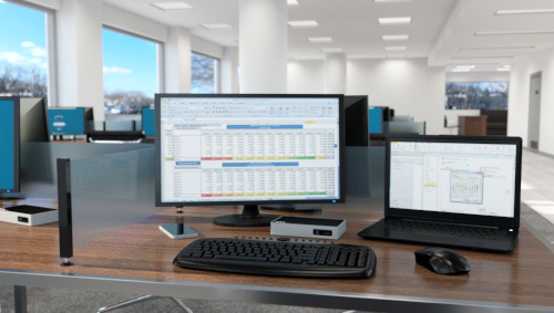 HDMI laptop docking station being used at multiple hot desks in an office setting